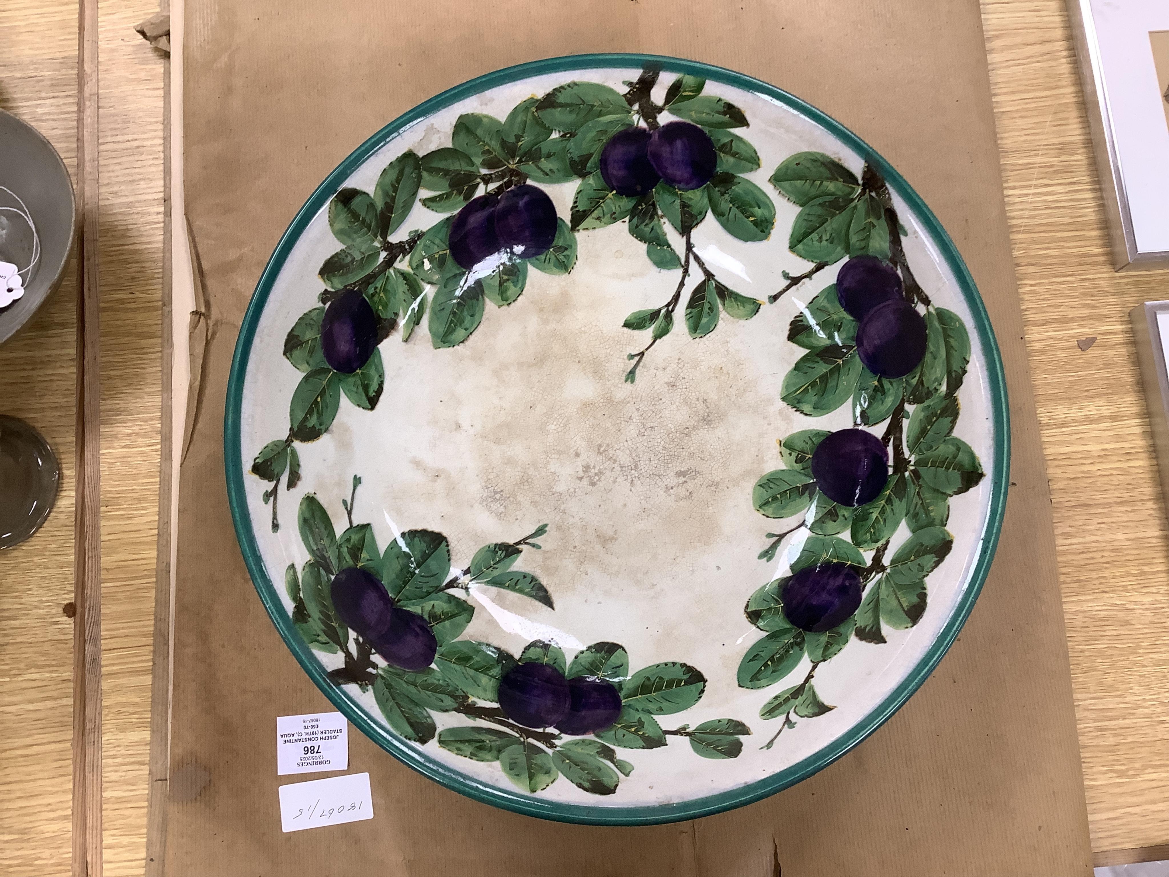 A Wemyss four-piece toilet set, a jug and basin, soap dish with liner, and bowl, damson pattern. Basin 39cm diameter., Condition - poor